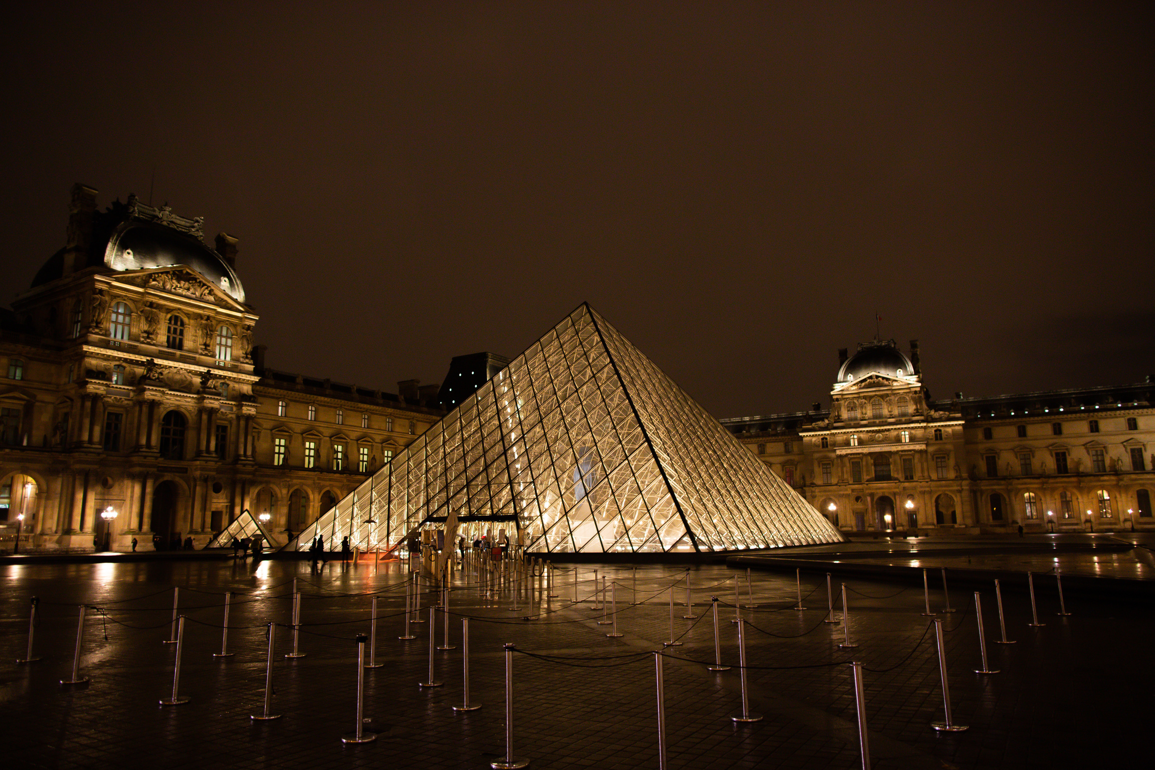 Large Glass Pyramid of Louvre Museum at Night